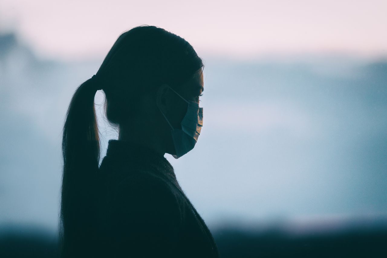 A girl wearing a mask