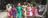 girls walking arm in arm