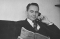 L. Tom Perry talking on phone