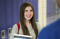 Young Woman by Locker