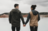 couple holding hands