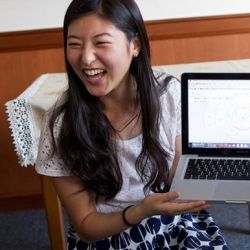 A girl does indexing on her computer