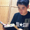Young Man from Japan Reading Scriptures