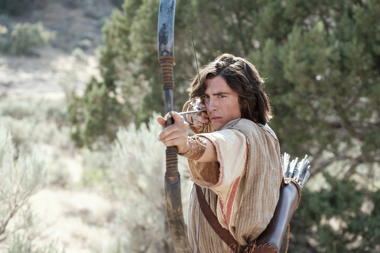 Nephi prepares to fire a bow and arrow