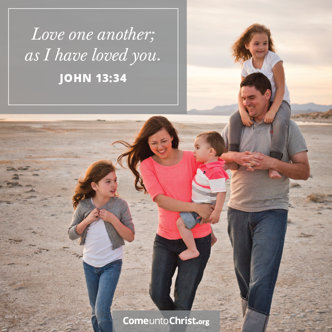 A family walks down the street together enjoying each others company