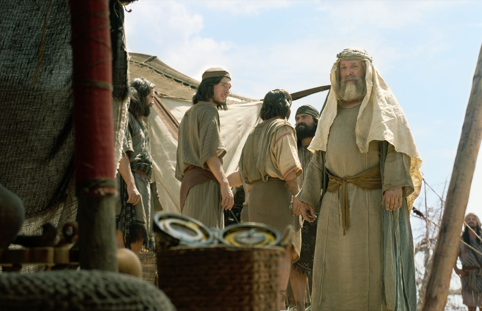 Lehi showing his family the Liahona