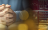folded hands next to computer monitors