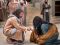 Christ and kneeling woman
