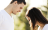 young man speaking to a young woman