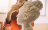 Artist working on a sculpture