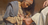 woman wiping Jesus’s feet with her hair