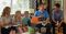 A family studying the Come Follow Me lesson.
