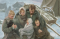 Pioneer Family Kneeling in Snow