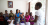 children and teacher singing