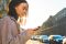 woman holding phone in the city