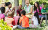 Woman sitting with children