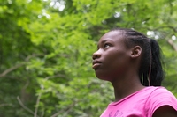 Young woman outdoors at Girls Camp
