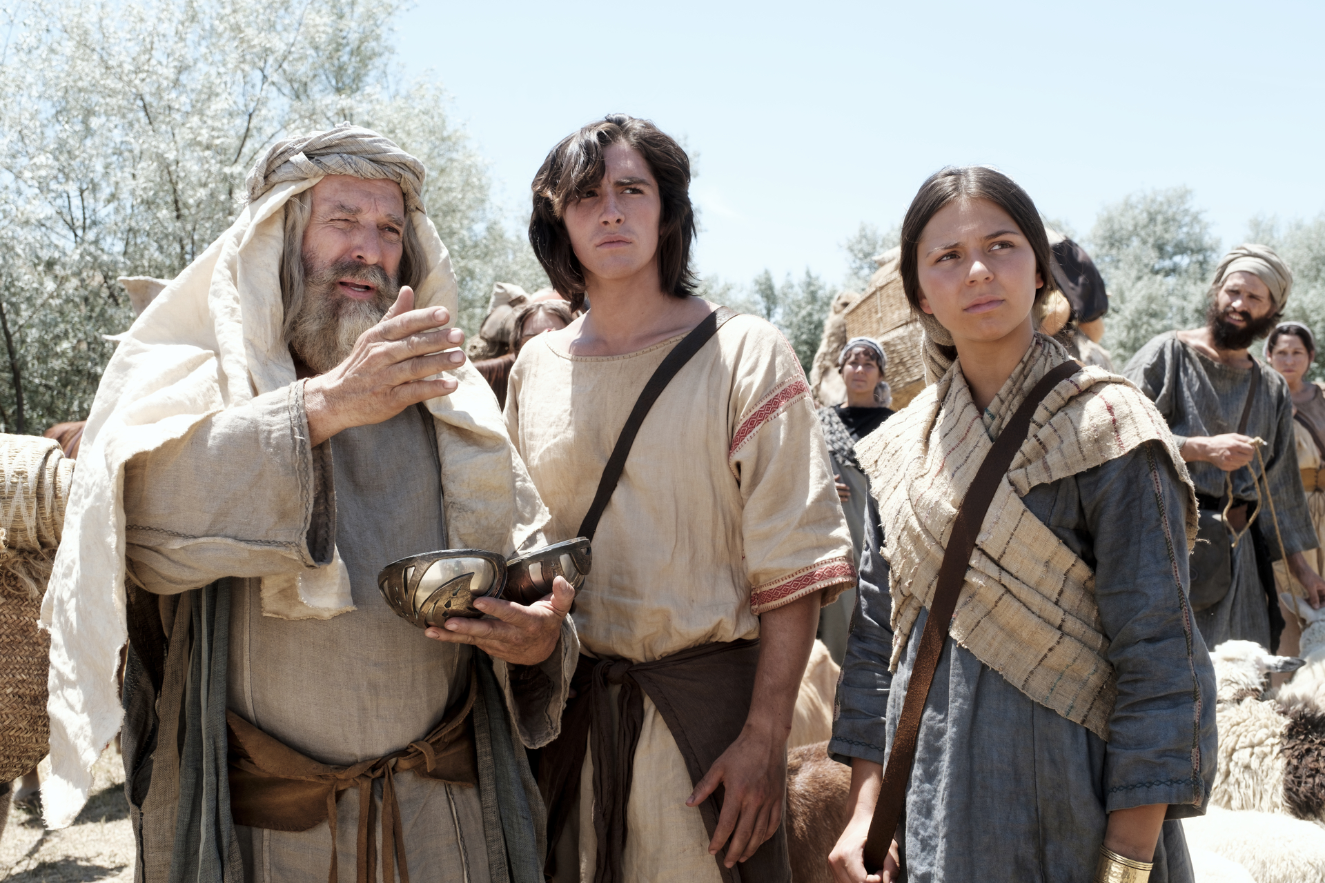 Lehi, Nephi, and Nephi's wife using the Liahona