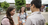 sister missionaries talking to young man