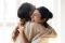 two women hugging each other