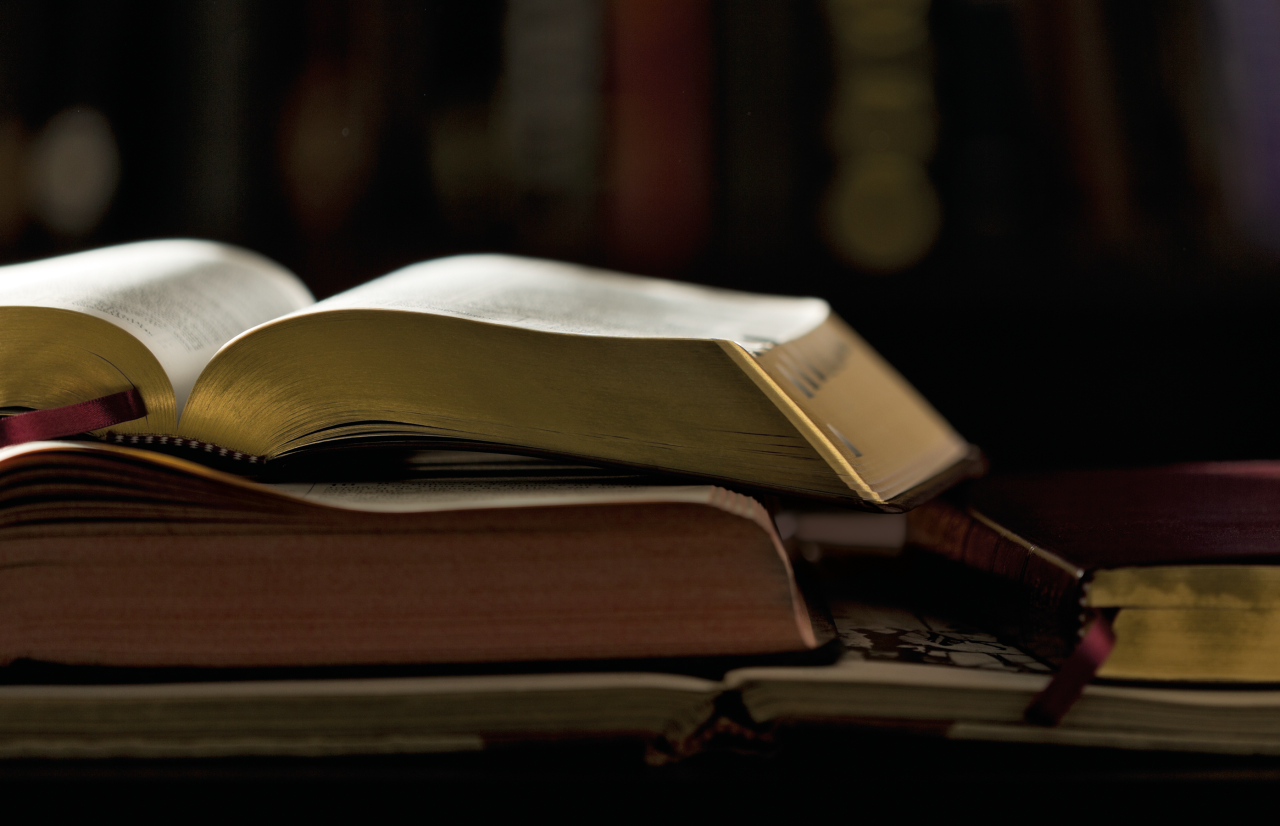 The Book of Mormon and the Bible lay open together testifying that God is real