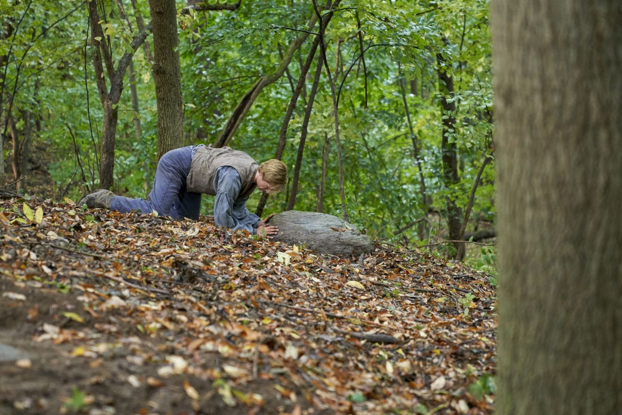 Joseph Smith Jr. Moving a Rock on the Hill Cumorah