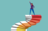 woman at top of staircase