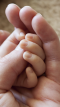 Hands (mother and baby)