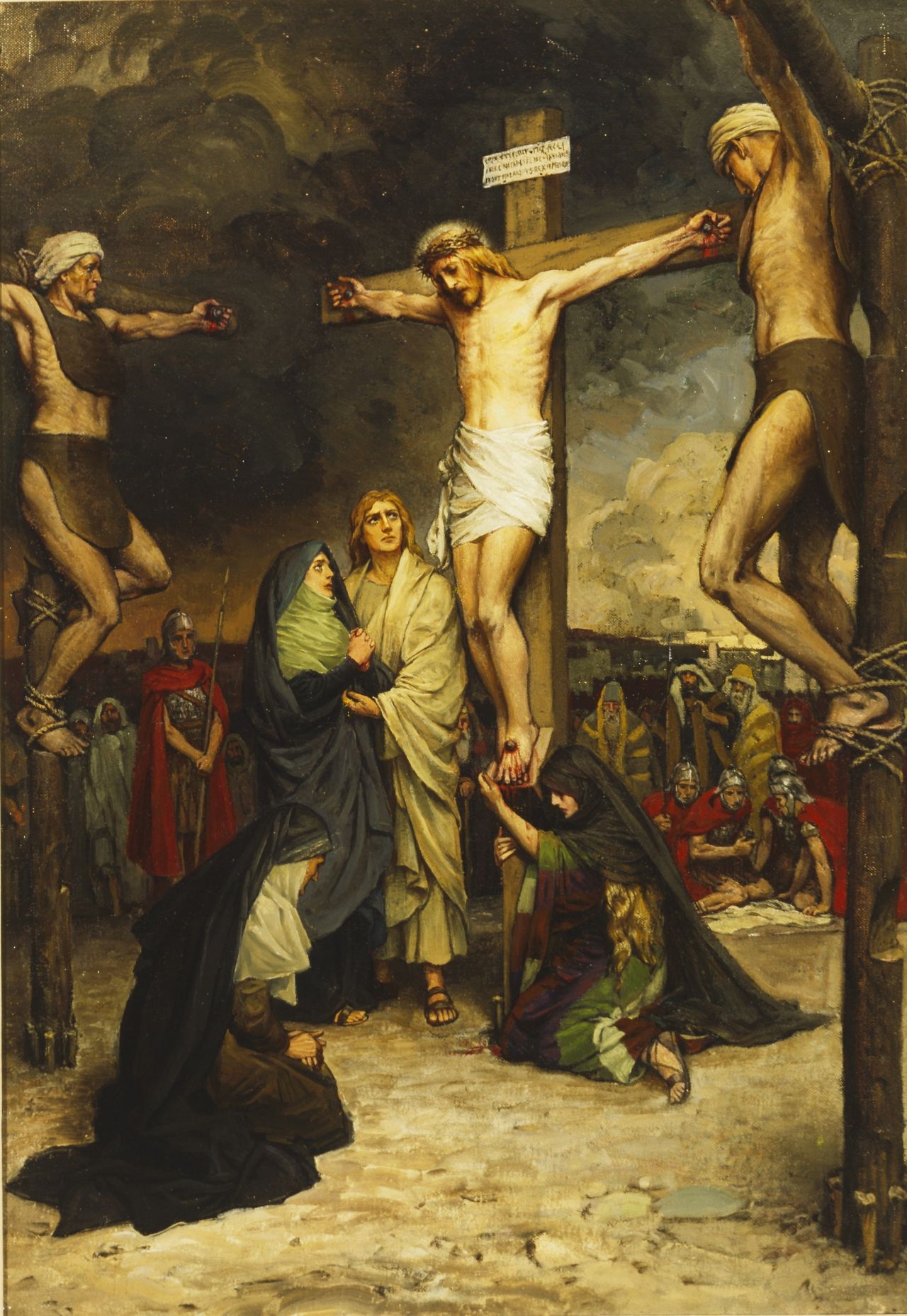 Jesus Christ is crucified between two thieves while His mother Mary and John the beloved mourn at the cross