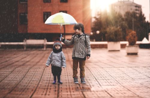 children with umbrella