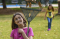 PRIMARY GIRLS SERVICE PROJECT, RAKING LEAVES