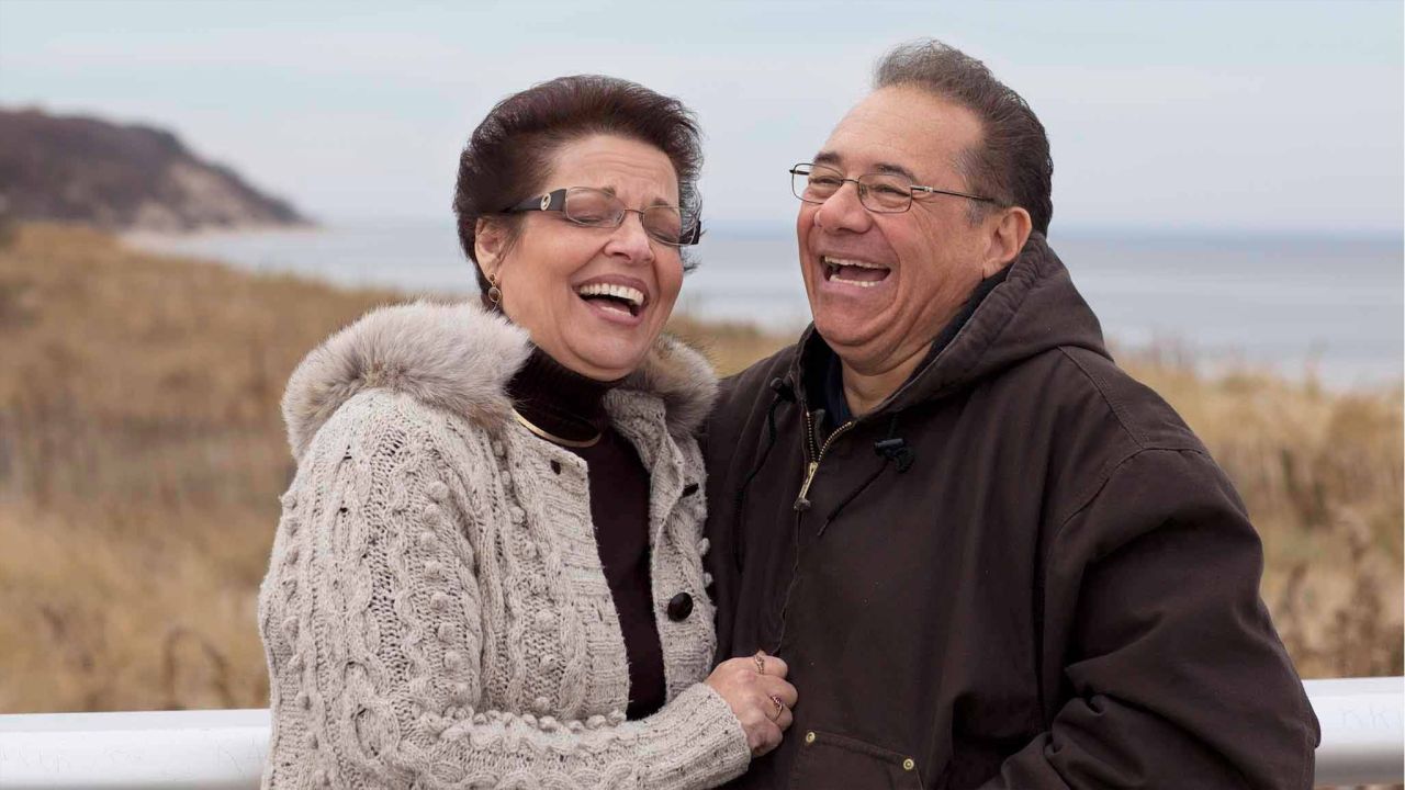 Frank stands with his wife explains the blessings of the gospel of Jesus Christ