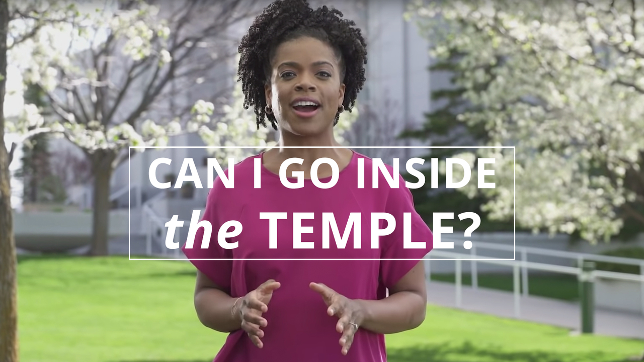 A woman stands outside a temple and explains the purpose of temples of the Church of Jesus Christ of Latter-day Saints