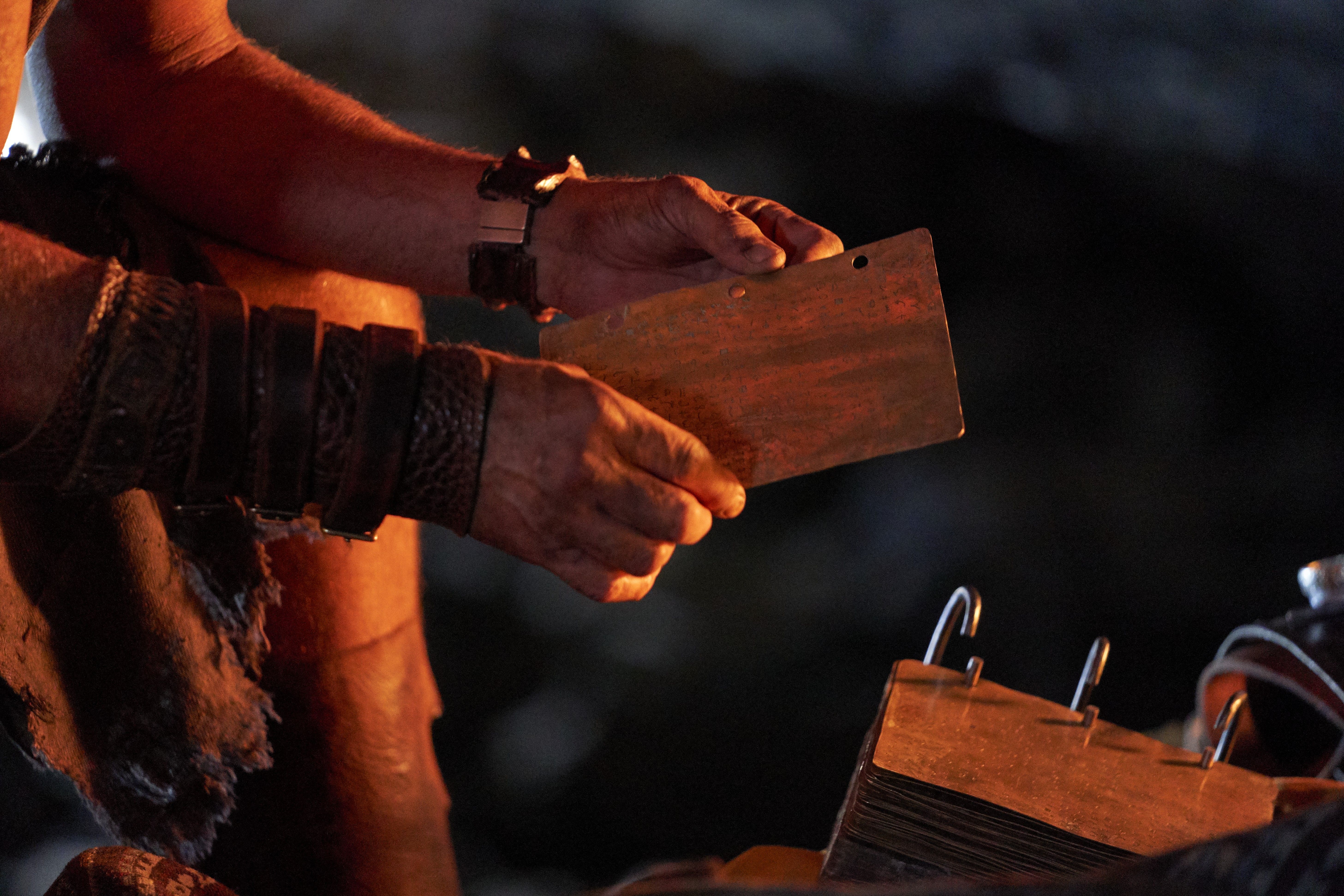 The Golden Plates Being Held