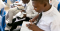 young men reading the scriptures