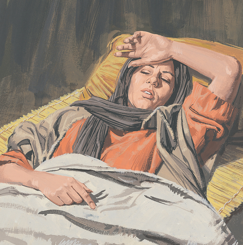 sick woman lying in bed