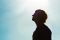 person standing in sunshine