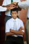 Boy receiving blessing