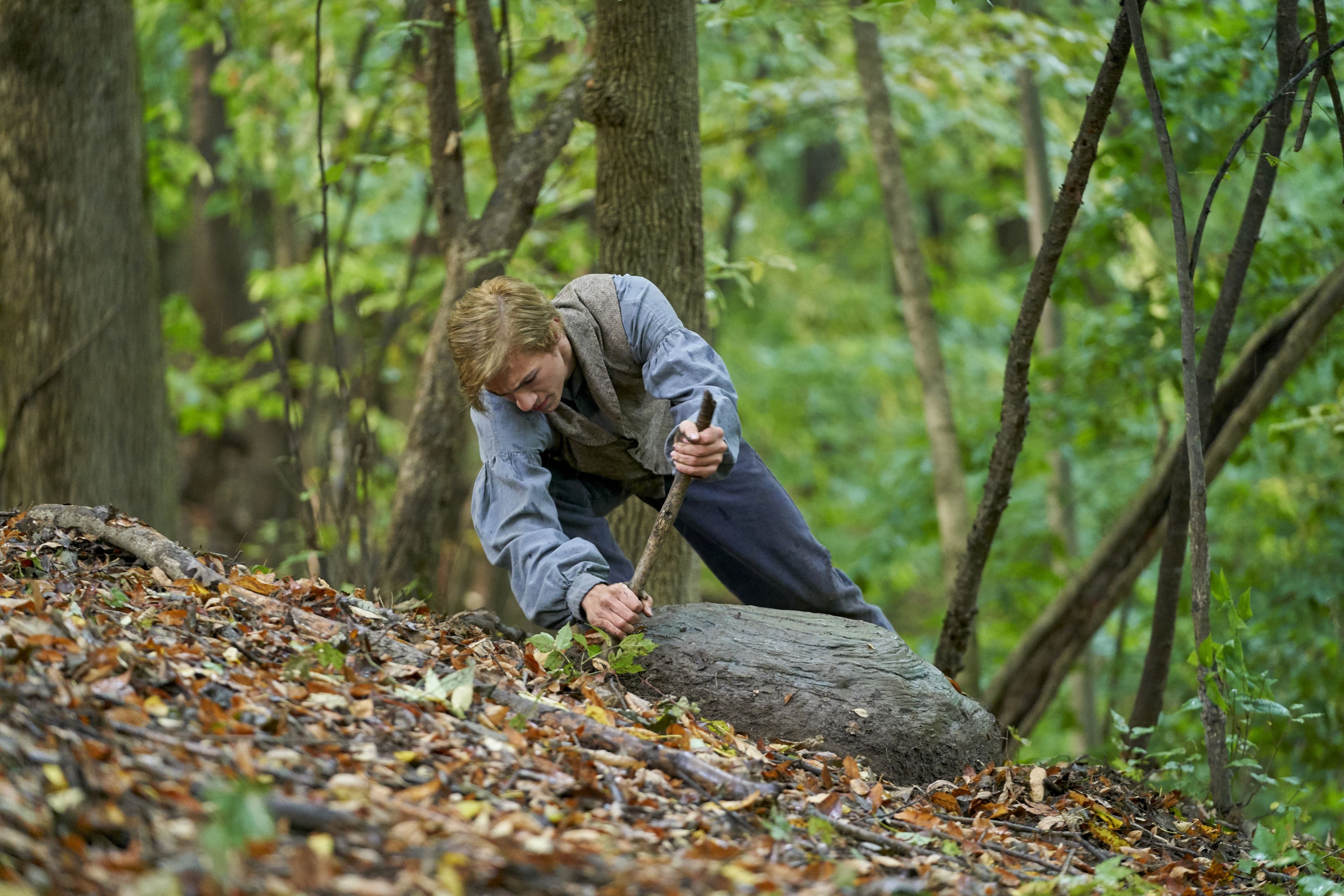 Joseph Smith Jr. Moving a Rock on the Hill Cumorah