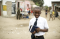 boy holding scriptures