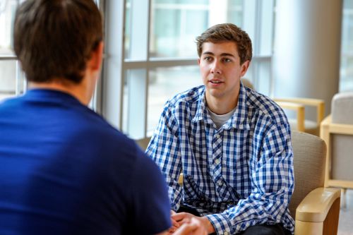 two men talking