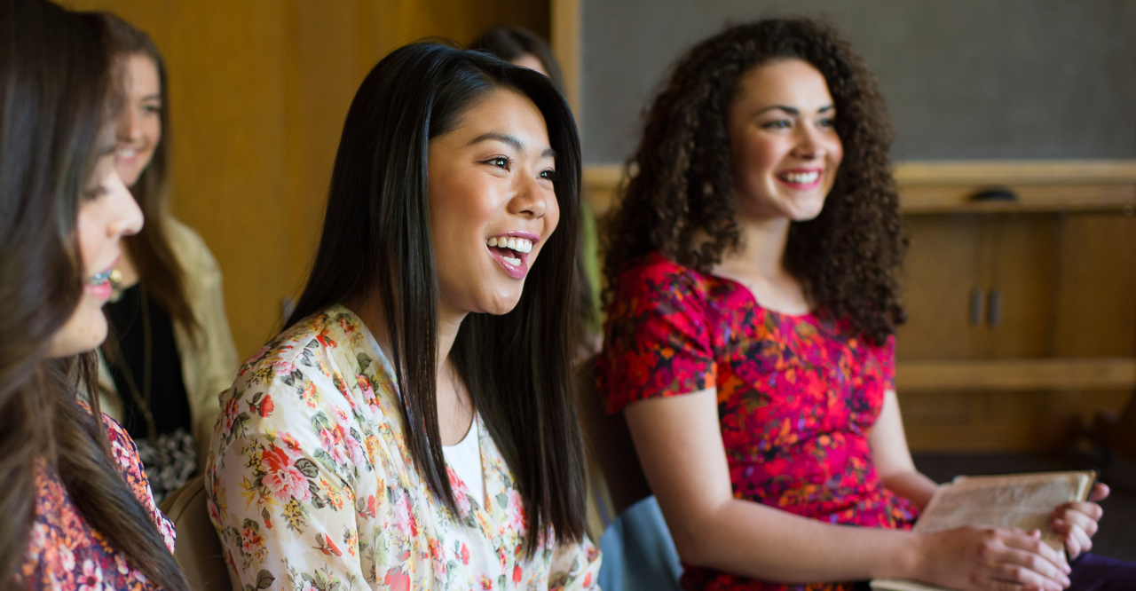 Women meet together in a church to discuss the true church of Jesus Christ
