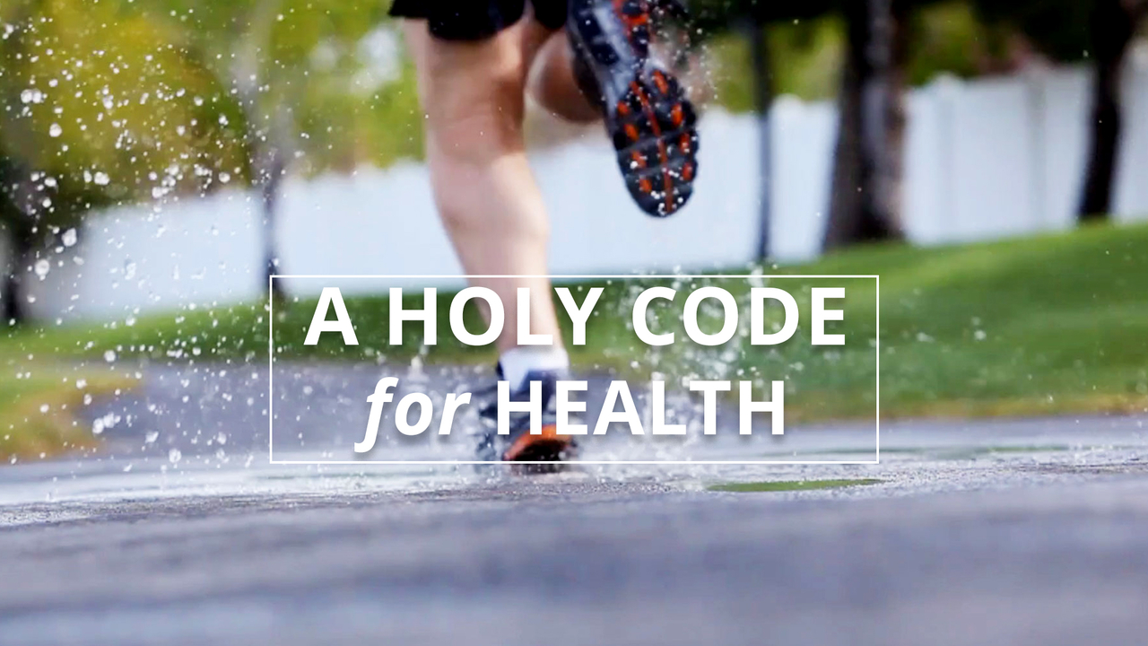A man runs down a street following the precepts of the word of wisdom by trying to stay healthy