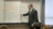 man in front of whiteboard