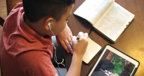 Young Man Listens to General Conference