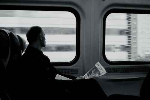 man sitting in train