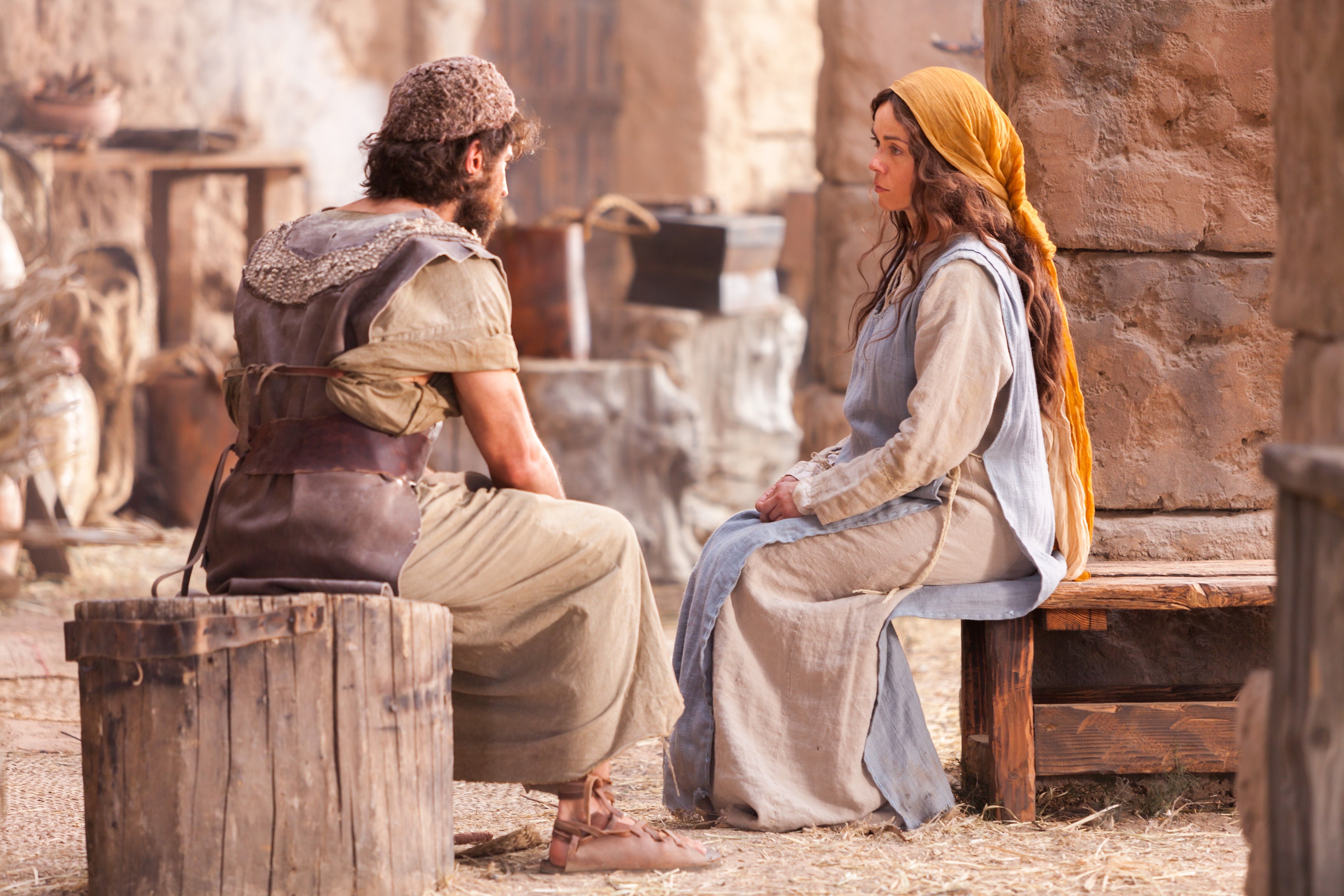 Mary speaks with Joseph to tell him of her miraculous pregnancy.