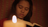 A girl reads the scriptures by candlelight