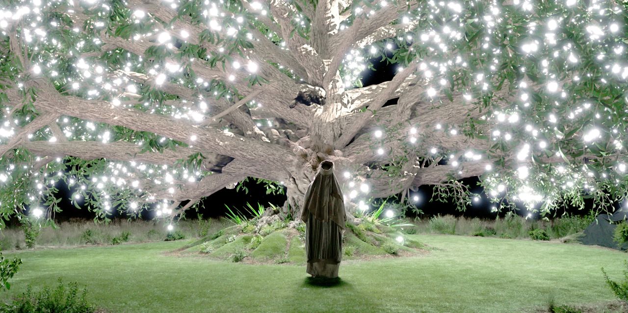 Lehi stands before the tree of life