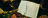 open Bible and scrolls